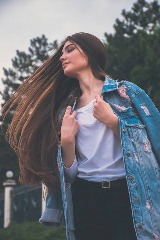 Long glossy brunette hair in motion