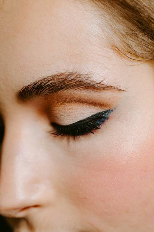 Winged eyeliner and soft glam makeup